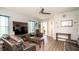 Bright living room boasts a large window and an open floor plan with lots of natural light at 5320 Aqua Breeze Dr, Bradenton, FL 34208