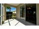 Inviting screened patio offers an indoor-outdoor transition overlooking a neatly manicured backyard at 5320 Aqua Breeze Dr, Bradenton, FL 34208