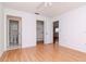 Open bedroom area with doorways to bathroom and closet spaces at 7710 Danube Dr # A, Hudson, FL 34667