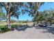 Scenic view of the golf course with lush greenery and mature trees, offering a serene atmosphere at 7710 Danube Dr # A, Hudson, FL 34667