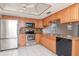 Well-appointed kitchen boasting stainless steel appliances, attractive countertops, and a functional layout at 7710 Danube Dr # A, Hudson, FL 34667