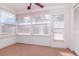 Sun room filled with lots of natural light coming through the multiple windows at 7710 Danube Dr # A, Hudson, FL 34667