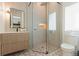 Modern bathroom with sleek vanity, glass enclosed shower, and tasteful tilework at 415 N Bay Blvd, Anna Maria, FL 34216