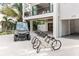 Charming exterior with driveway parking and available golf cart at 415 N Bay Blvd, Anna Maria, FL 34216
