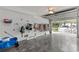 Organized garage with slatwall storage and access to bikes and beach equipment at 415 N Bay Blvd, Anna Maria, FL 34216