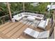 Overhead view of roof deck featuring ample seating, lounge chairs, and neighborhood views at 415 N Bay Blvd, Anna Maria, FL 34216