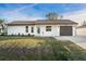 Charming single-story home featuring a well-maintained lawn and inviting curb appeal with a single car garage at 4107 Mulgrave Ave, North Port, FL 34287