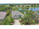 Aerial view showcases a home's well-kept exterior, landscaping, and charming architectural details at 11530 57Th Street E Cir, Parrish, FL 34219