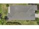 Aerial top-down perspective of a house roof showing its structure and roofing material at 11530 57Th Street E Cir, Parrish, FL 34219