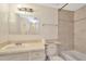 Bathroom features a shower-tub combo and a single sink vanity at 6320 Newtown Cir # 20B1, Tampa, FL 33615