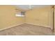 Carpeted bedroom with neutral paint and ceiling fan at 6320 Newtown Cir # 20B1, Tampa, FL 33615