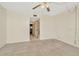 Spacious bedroom with neutral walls and soft carpet at 6320 Newtown Cir # 20B1, Tampa, FL 33615