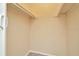 A walk-in closet with a rod offers additional storage space at 6320 Newtown Cir # 20B1, Tampa, FL 33615