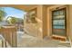 Inviting condo entrance with a 'hello' doormat and a view of palm trees at 6320 Newtown Cir # 20B1, Tampa, FL 33615