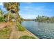 Relaxing waterfront view along a serene canal surrounded by lush landscaping and condos at 6320 Newtown Cir # 20B1, Tampa, FL 33615