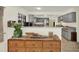 Stylish kitchen with modern gray cabinets, stainless steel appliances, and functional layout at 11419 Donneymoor Dr, Riverview, FL 33569