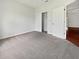Bedroom with carpet, neutral paint, closet, and natural light at 3328 Circleville St, North Port, FL 34286