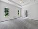 Primary bedroom boasts ample space, natural light, and plush carpeting at 3328 Circleville St, North Port, FL 34286