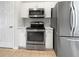 Modern kitchen with stainless steel appliances and granite countertops at 3328 Circleville St, North Port, FL 34286