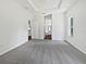 Spacious main bedroom featuring recessed lighting, a neutral color palette, and gray carpeting at 3328 Circleville St, North Port, FL 34286