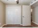 Bedroom with spacious closet and neutral walls at 4702 E Idlewild Ave, Tampa, FL 33610