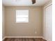 Bedroom with standard closet and modern ceiling fan at 4702 E Idlewild Ave, Tampa, FL 33610