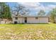 Spacious backyard view of the rear exterior at 7216 E Emma St, Tampa, FL 33610