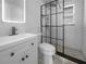 Modern bathroom with updated vanity, glass enclosed shower, and contemporary fixtures at 913 27Th E St, Bradenton, FL 34208