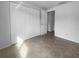 Neutral bedroom showcasing tile floors and large closet, offering comfort and functionality at 913 27Th E St, Bradenton, FL 34208