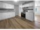 Updated kitchen featuring stainless steel appliances, white cabinets, and modern finishes at 913 27Th E St, Bradenton, FL 34208