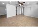 Bright open-concept living area with tile flooring, neutral walls and plenty of natural light at 913 27Th E St, Bradenton, FL 34208