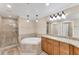 Beautiful bathroom featuring a separate shower, bathtub, and sink at 606 Riviera Dunes Way # 604, Palmetto, FL 34221