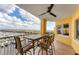 Balcony seating area with great marina views at 606 Riviera Dunes Way # 604, Palmetto, FL 34221