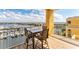 Balcony with seating area and views of marina at 606 Riviera Dunes Way # 604, Palmetto, FL 34221