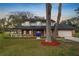 Charming two-story brick home with a welcoming front porch and well-maintained lawn at 6604 Stafford Terrace Ave, Plant City, FL 33565