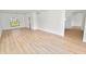 Large living room with hardwood floors, recessed lighting, and great natural light at 6604 Stafford Terrace Ave, Plant City, FL 33565