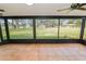 Relaxing screened-in porch with views of the backyard at 6604 Stafford Terrace Ave, Plant City, FL 33565