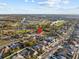 High-angle view of a home in a well-maintained neighborhood with lakes and community green spaces surrounding at 821 Greenview Dr, Apollo Beach, FL 33572