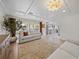 Bright living room features coffered ceilings, an open floor plan and recessed lighting at 7746 Westmoreland Dr, Sarasota, FL 34243
