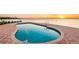 Inground swimming pool featuring brick-paver patio and unobstructed water views at 1903 Gulfview Dr, Holiday, FL 34691