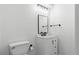 Bright bathroom with modern vanity, sleek fixtures, and a minimalist design at 606 Indiana Ave, Crystal Beach, FL 34681