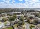 Aerial view of a neighborhood featuring mature trees, well-kept lawns and a mix of single-Gathering homes at 4604 Hunts Ave, Plant City, FL 33566