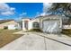 Charming single-Gathering home with a well-manicured front lawn and a two-car garage at 4604 Hunts Ave, Plant City, FL 33566