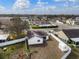 Bright single-story home featuring white fence and solar panels on the roof at 4604 Hunts Ave, Plant City, FL 33566