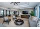 Stylish clubhouse with plenty of seating, a media center, and decor creating a welcoming atmosphere for residents at 6744 Back Forty Loop, Zephyrhills, FL 33541