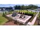 Community playground surrounded by lush green grass and landscaping at 6744 Back Forty Loop, Zephyrhills, FL 33541
