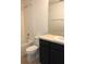 Well-lit bathroom features a shower/tub combo and vanity with storage at 7037 Towering Spruce Dr, Riverview, FL 33578