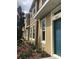 Stylish townhome with manicured landscaping, and vibrant pops of color at 7037 Towering Spruce Dr, Riverview, FL 33578