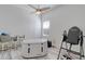 Bedroom with an inversion table, hydro plunge and stylish decor at 4721 Country Manor Dr, Sarasota, FL 34233