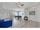 Bright living room features a pool table, stylish light fixtures, and fresh paint at 4721 Country Manor Dr, Sarasota, FL 34233